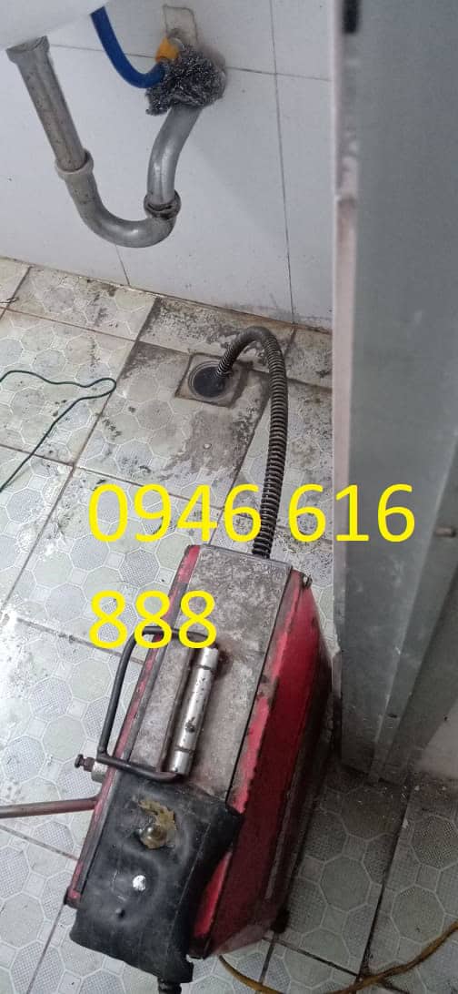 thông tác bồn cầu tại đường láng bằng máy lò xo